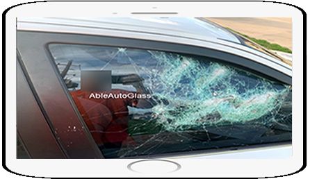 The photo is from an attempted break-in.  The laminated door glass prevented the theft from getting inside of 
this car.