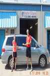 Able Auto Glass replaced a side cargo 
sliding door glass on this Mini Van.   This photo is with the client and the owner of Able Auto Glass in Houston, TX.  The glass was dark privacy tint.